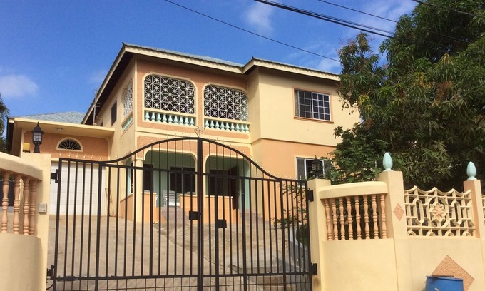 Ewarton Apartment | Kathy's Cool Getaway is located near to shopping and transportation.