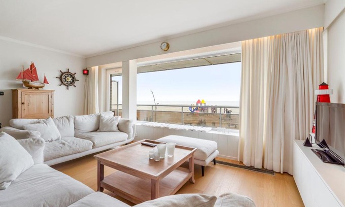Oostduinkerke-Bad Apartment | Kindvriendelijk app met frontaal zeezicht &garage