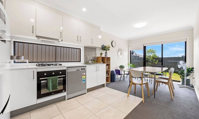 Austral House | KozyGuru | Austral | Charming 4Bedroom Family Home