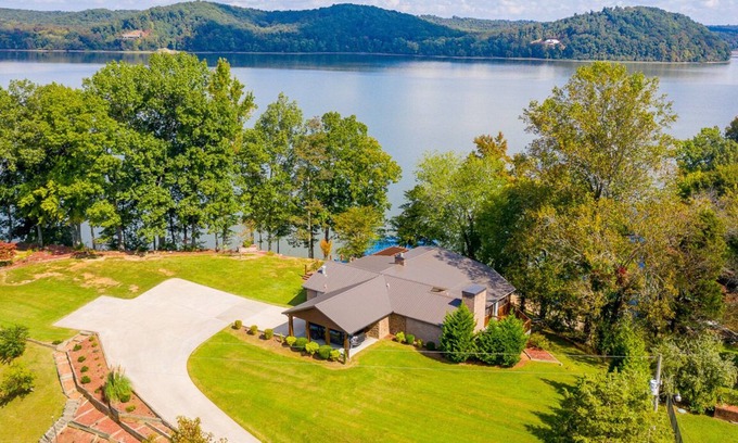 Stewart House | Lake front with dock and boat ramp