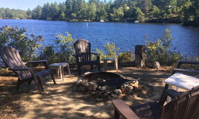 Freedom Cabin | Lake Ossipee New Hampshire waterfront cabin with beach, dock, fire pit, privacy.