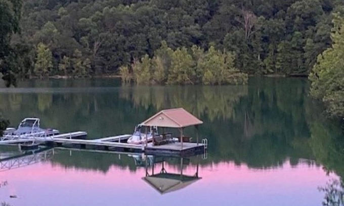 Jacksboro Cottage | Lakefront Cabin in quiet cove. No steps to private boat slip. Pet friendly.