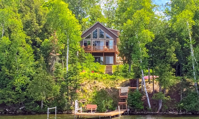 Presque Isle House | Lakefront home w/furnished deck, firepit & private dock - dogs OK