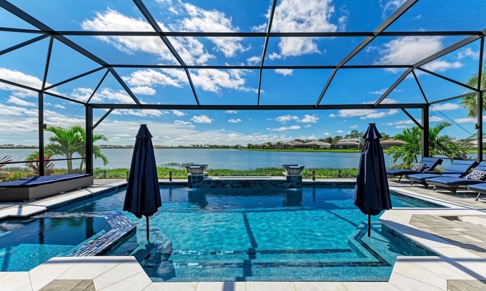 Braden River House | Lakefront Luxury Pool Spa Gym - Private Home with resort-like surroundings