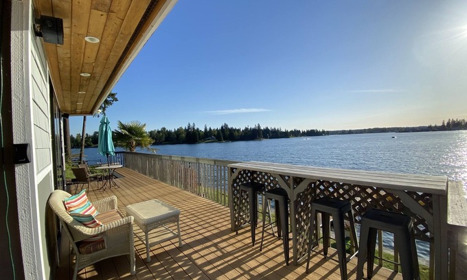 Bonney Lake Cottage | Lakefront Studio Cabin & Tiki Hut. Enjoy Summer Fun and Winter Serenity!