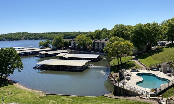 Lake of the Ozarks Condo | Lakefront Views, Bright & Airy Condo w/2 Pools, 2 Hot Tubs & Dock Access