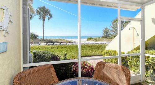 Longboat Key Apartment | LaPlaya 104A Gulf front Walk right from your lanai onto the private beach