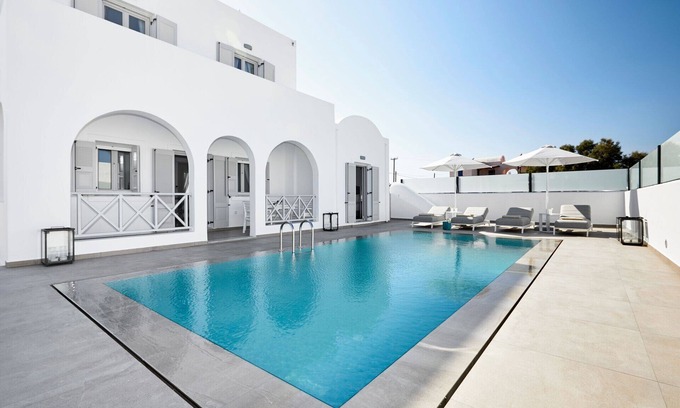 Monolithos Villa | Lavish Santorini Villa | Aegean Serenity Villa | 3 Bedrooms | Private Heated Pool | Lovely Furnished Terrace | Shaded Outdoor Dining Area | Prime Location | Monolithos