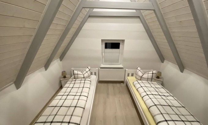 Barmstedt Apartment | Living under the roof