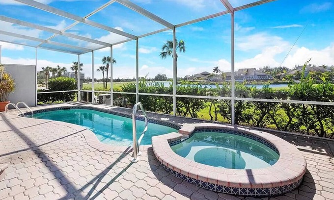 Bay Isles Villa | Longboat Key Oasis, golf course water views, pool, hottub