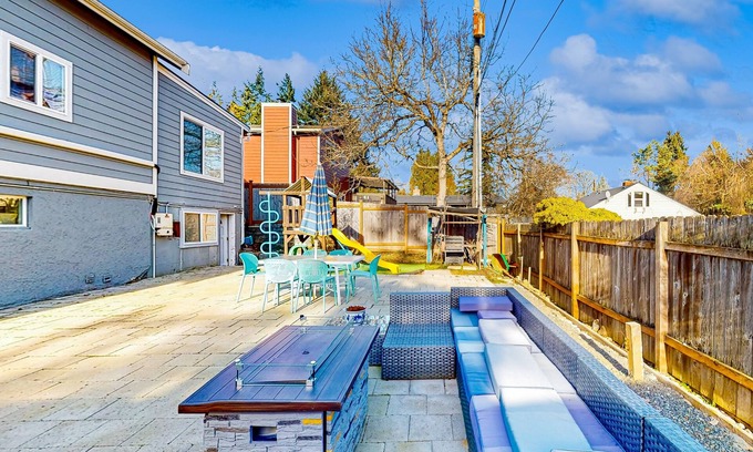 Haller Lake House | Lower-level home with fenced backyard, playground, BBQ, firepit, streaming, AC