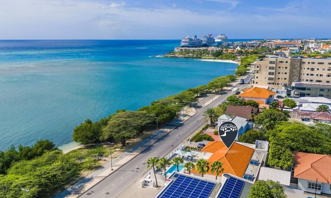 Oranjestad Villa | LUX 10BR Pool Beach Front Villa Playa by Bocobay