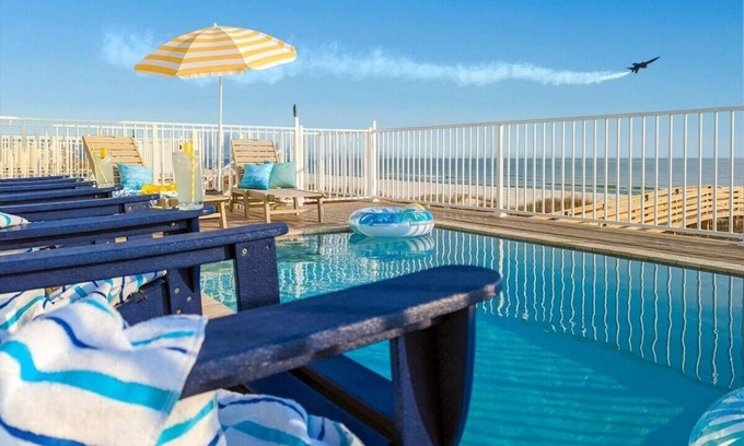 Southpointe House | Lux Beachfront w/Private Gas Heated Pool, Elevator, Indoor/Outdoor Game Rooms