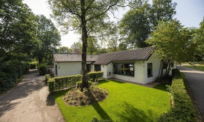 Lieren House | Luxurious group accommodation with stylish decor, modern amenities, six bedrooms, spacious kitchen, and garden, ideal for a relaxing stay.