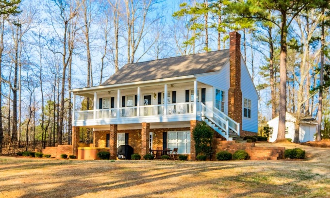 Henrico House | Luxury Lakefront Escape with Sunset Views, Private Boathouse, and Endless Fun!