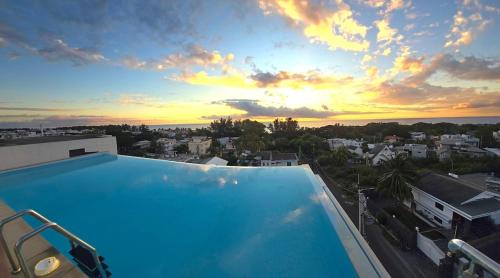 Flic-en-Flac Apartment | Luxury Penthouse with Rooftop Infinity Pool