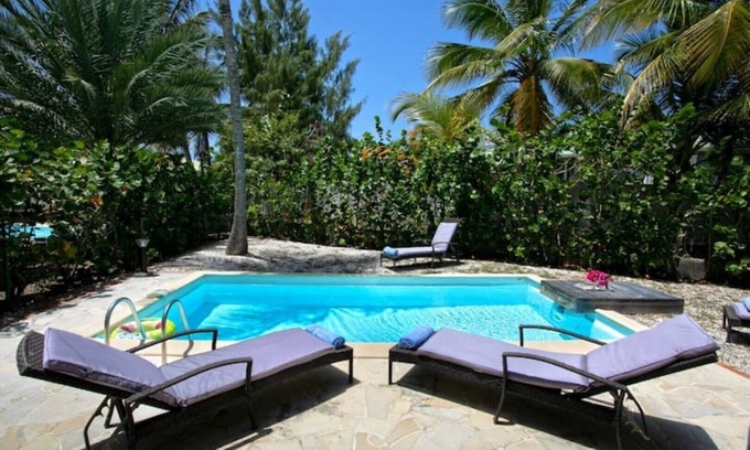 Orient Bay Villa | Macassi 4, Charming beachfront villa.