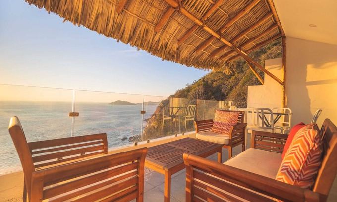 Brisas del Marques Condo | Magical sunsets, king bed, and pro service B403