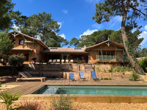 L'Herbe Villa | Magnifique maison à 20 m de la mer vue bassin