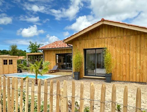 Lit-et-Mixe Villa | Maison en bois avec piscine proche de la plage
