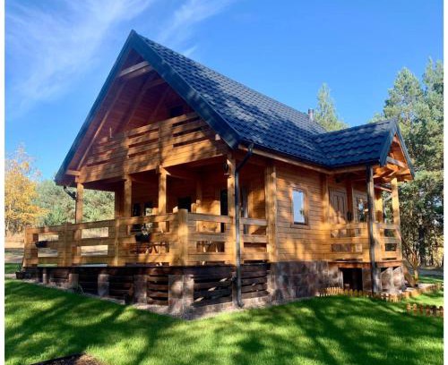 Lidzbark Welski House | Mazurska bania u Pana Szeptuna - drewniany dom na skraju lasu