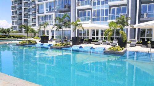 Lapu-Lapu Apartment | Minimalist 1BR Mactan Newtown Suite w Pool