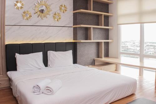 Cikarang Apartment | Minimalist and Cozy Studio at Vasanta Innopark Apartment By Travelio