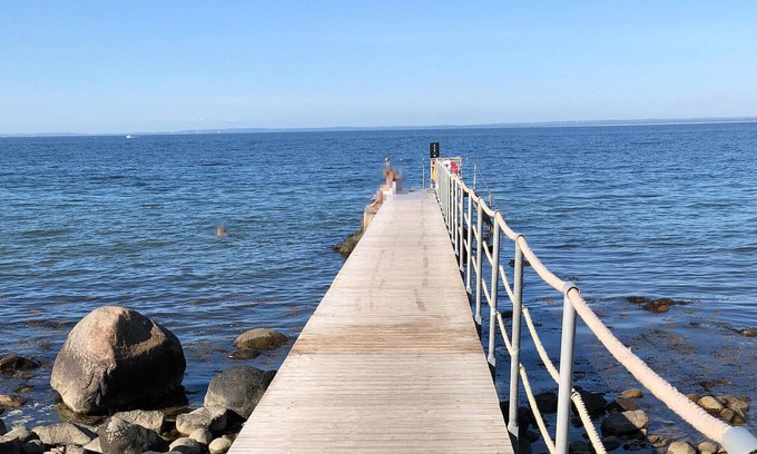 Bastad Apartment | Modern and comfortable vacation apartment with shared outdoor pool, in the summery town of Båstad.