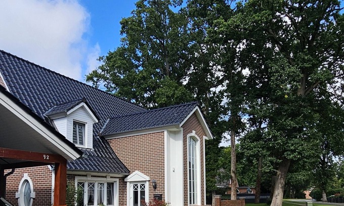 Midlum Apartment | Modern and cozy vacation apartment on the North Sea, rural, quiet, with garden