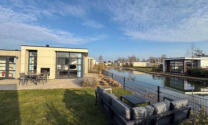 Olburgen House | Modern Chalet with Fenced Garden, Boat Mooring, Sauna and Pool in Olburgen