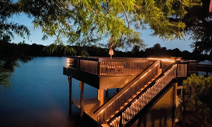 Lake Houston House | Modern Lakefront Treehouse with Pedal boat, 2 Kayaks, Sun Deck and Arcade