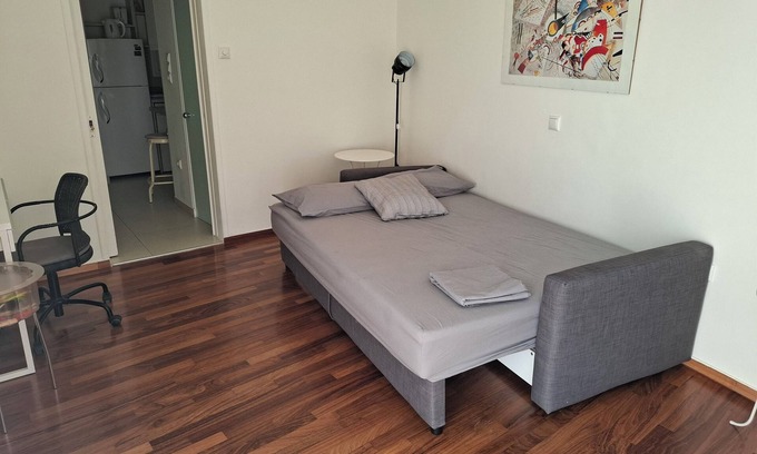 Ano Kipseli Apartment | Modern, sunny, bright downtown apartment.