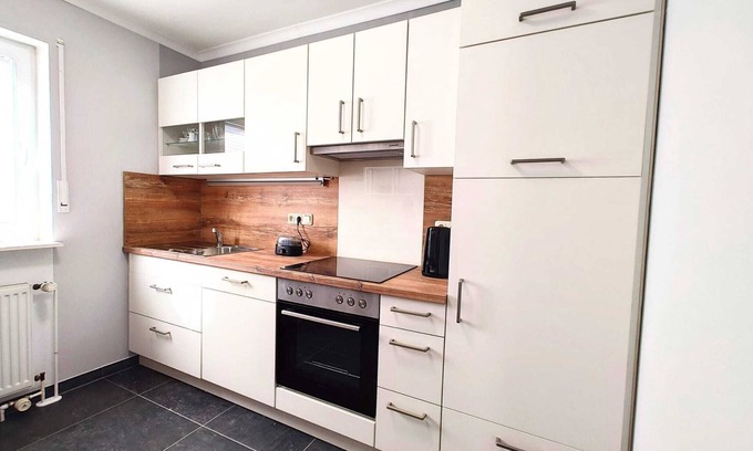 Sandhorst House | Modern vacation home with terrace in a quiet cul-de-sac in beautiful Aurich