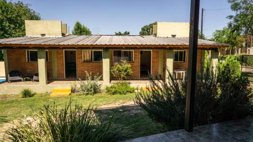 Cosquin Apartment | Monoambiente amplio con pileta