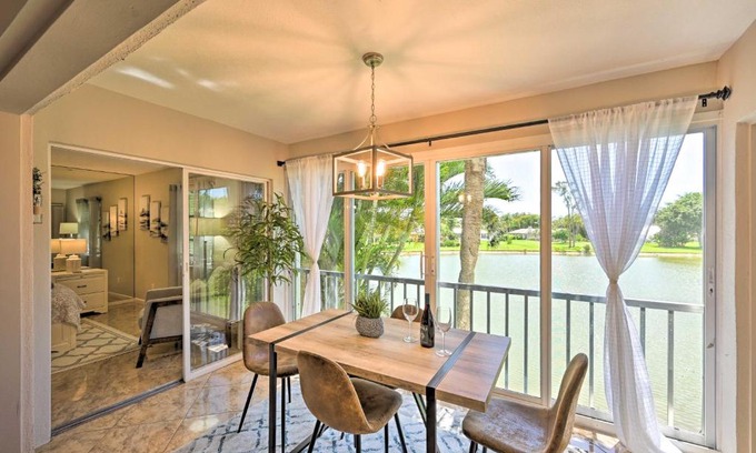 Central Naples Apartment | Naples Condo with Enclosed Balcony and Lake Views!