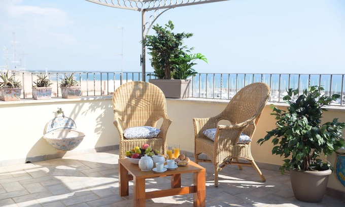 Nettuno Apartment | Neptune holiday home, penthouse and penthouse in the sea view village near beaches