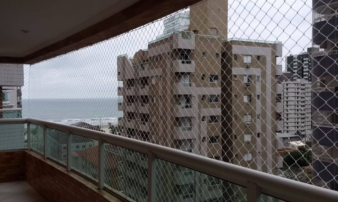 Canto do Forte Apartment | New apartment in Canto do Forte with sea view, close to the beach