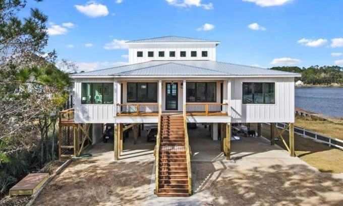 Gulf Shores House | New, bayfront custom home with pier for your boat plus outside deck