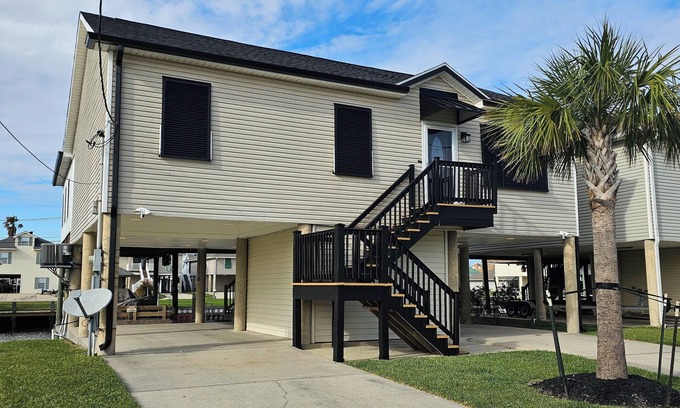 Barataria House | New listing!Raised waterfront property for some great fishing and entertaining