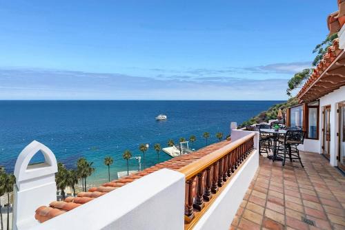 Avalon Apartment | NEW! Premium Ocean Views, Corner Condo with Fireplace and Golf Cart
