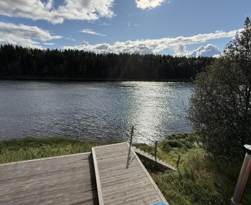 Vindeln Municipality House | Newly Renovated Red Riverfront House