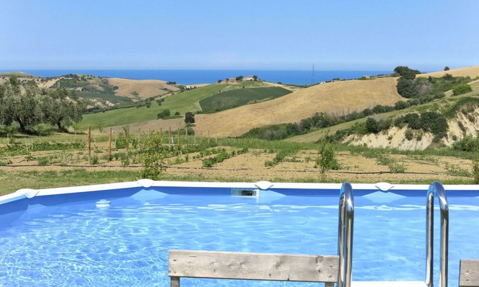 Cologna Spiaggia Villa | Nice apartment in villa with pool, hot tub, A/C, WIFI, TV, patio, pets allowed and panoramic view