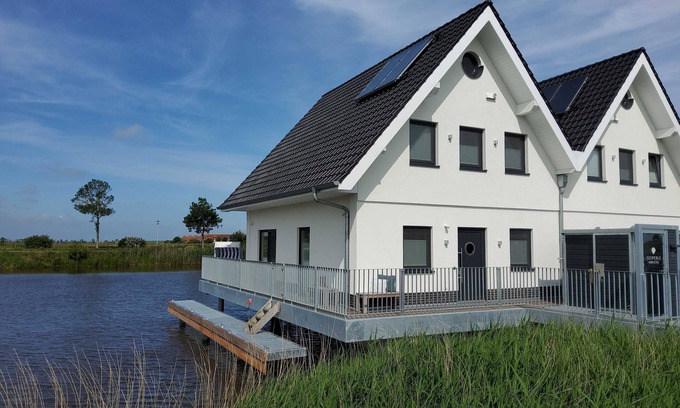 Harlesiel House | No. 110 - Holiday home Seeperle/Stilt house on the Harle - No. 110 - Exclusive
