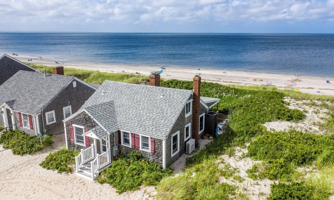 East Sandwich Cottage | Ocean front oasis nestled into the dune on a private East Sandwich beach.