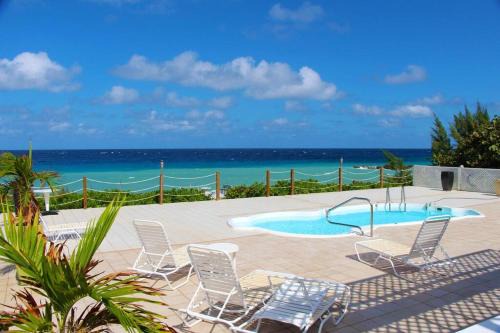 West Bay House | Oceanfront Oasis Home with cottage & pool