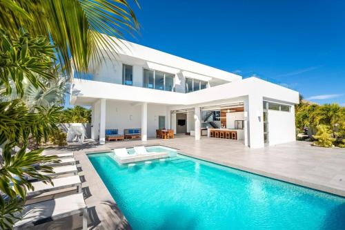 Long Bay Villa | Oceanside 3 Bedroom Luxury Villa with Private Pool, 500ft from Long Bay Beach -V5