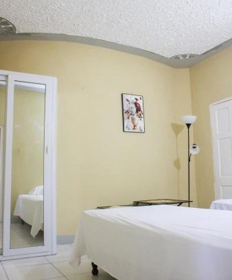 Salt Gut Apartment | Oceanview 2BR Getaway 3min Beach 5min Airport