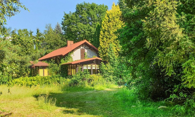 Czerwinsk nad Wisła House | On a natural property this charming vacation home near the Vistula welcomes you.