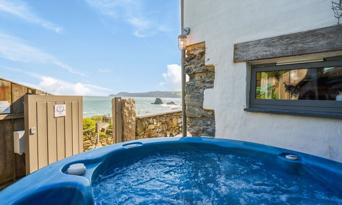 Charlestown Cottage | ON AMAZING SPACES! Luxurious Beach Front Retreat with Hot Tub & Log Burner