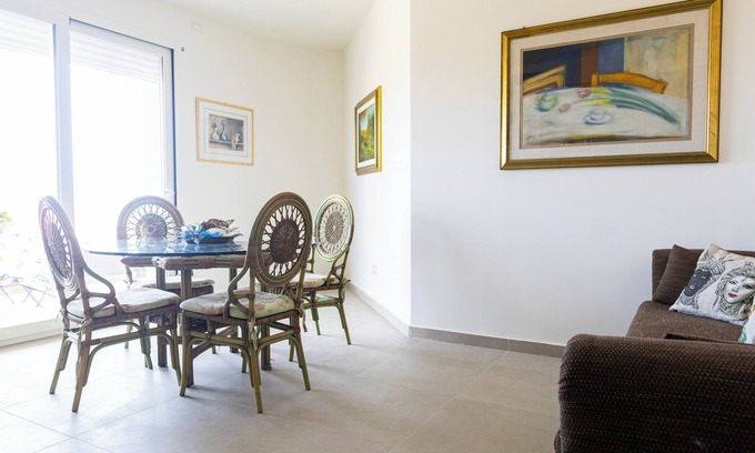 Aci Castello Apartment | On the sea of Acitrezza with a view of the Faraglioni rocks and private descent to the sea.